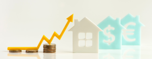 Houses and a graph showing and increase in money.