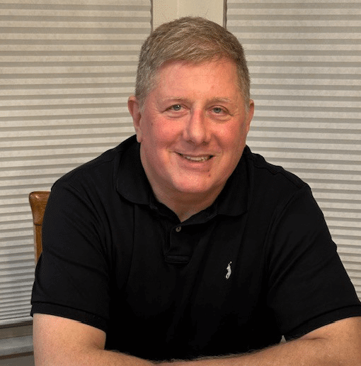 Professional image of Aaron Novotney, real estate warrior