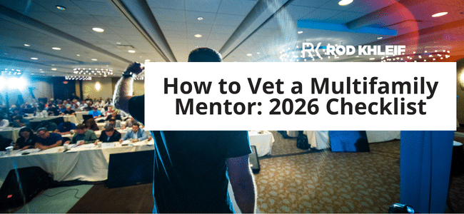 Presenter on stage addressing a conference audience; slide reads 'How to Vet a Multifamily Mentor: 2026 Checklist'